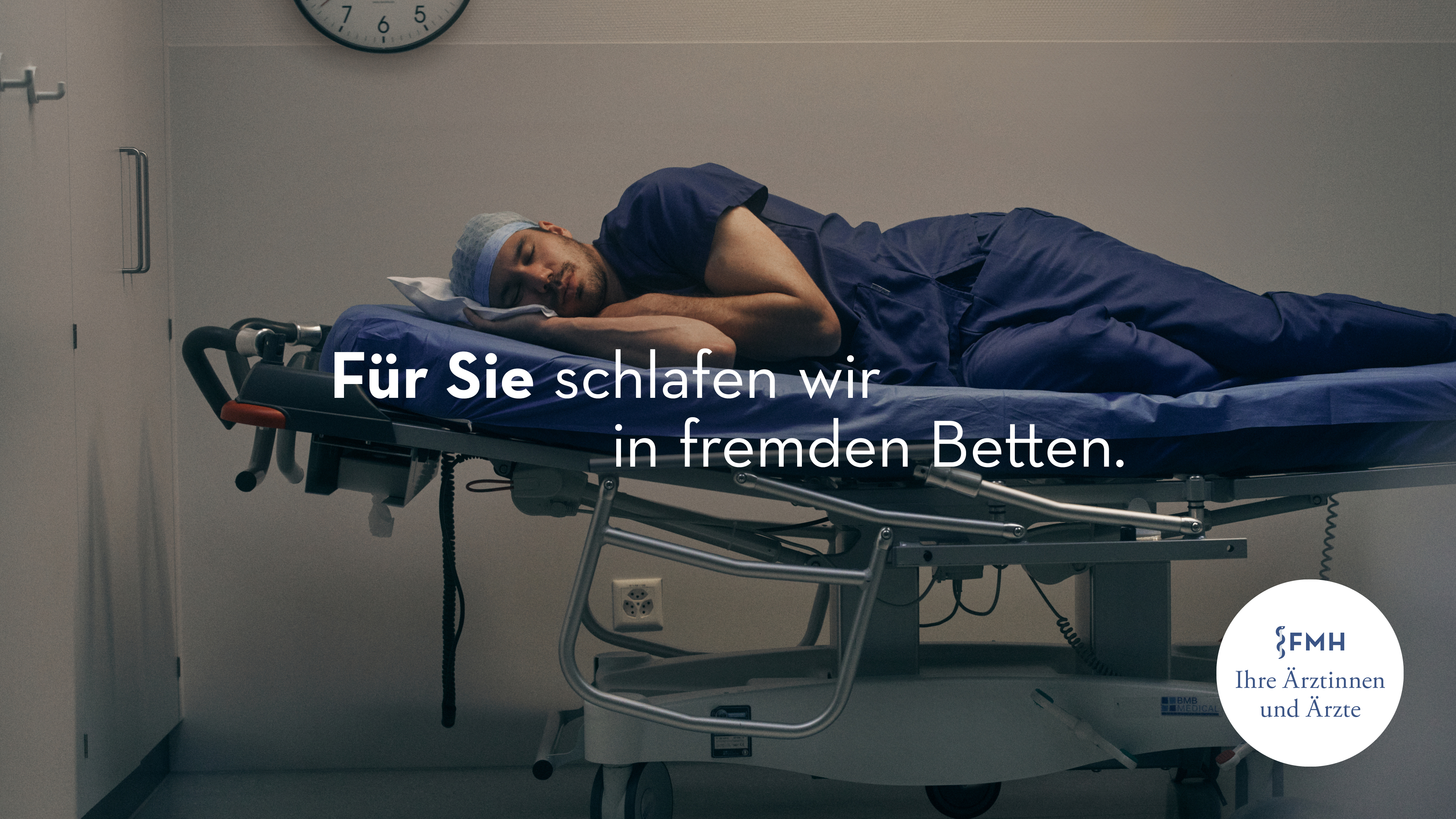 A doctor sleeping an a stretcher